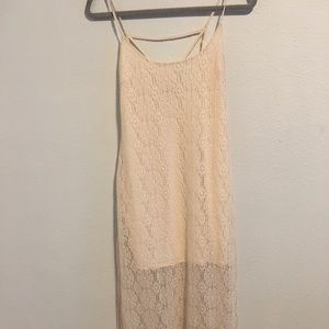 Lacey dress with slip underneath.